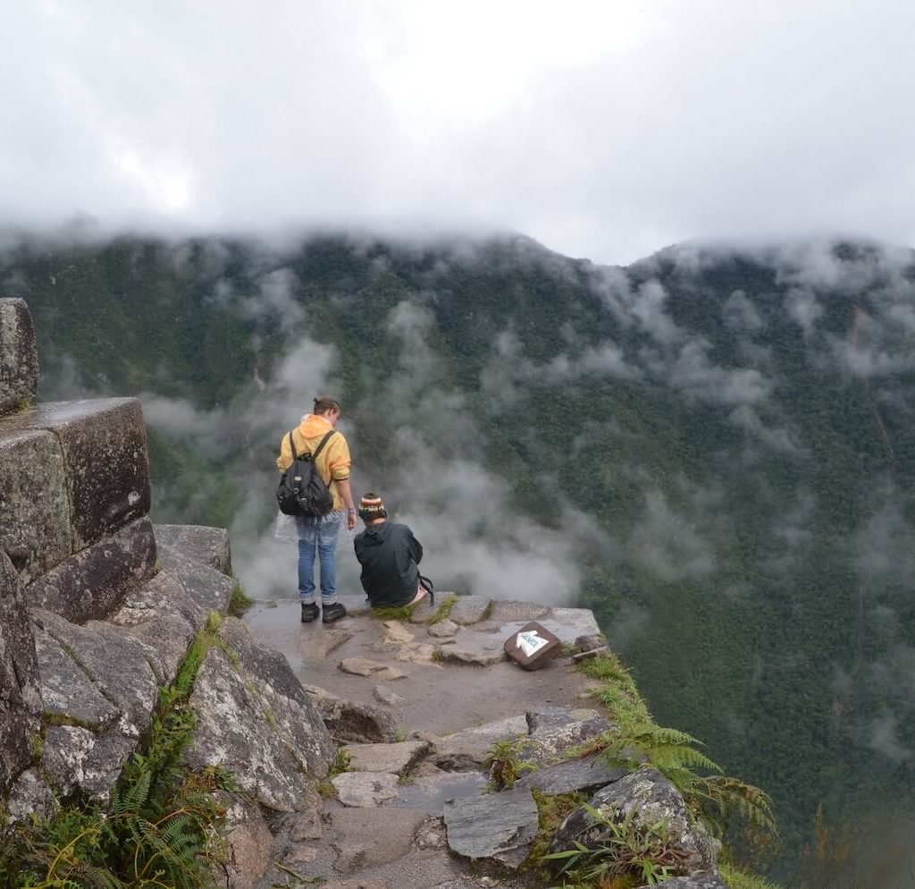 Huayna Picchu with persons and mountains